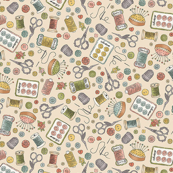fabric with sewing notions on a cream background