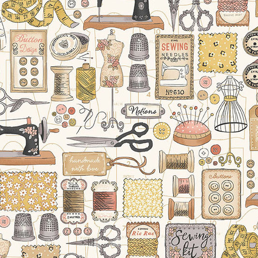 fabric with sewing notions on cream