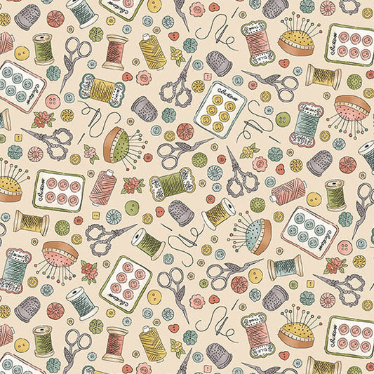 fabric with sewing notions on a cream background