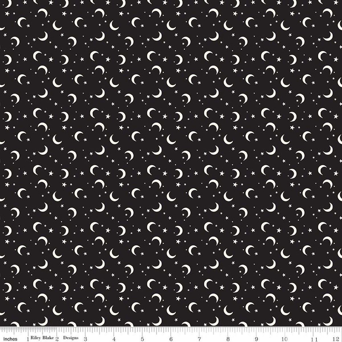 Fabric of white crescent moons and stars on a black background 