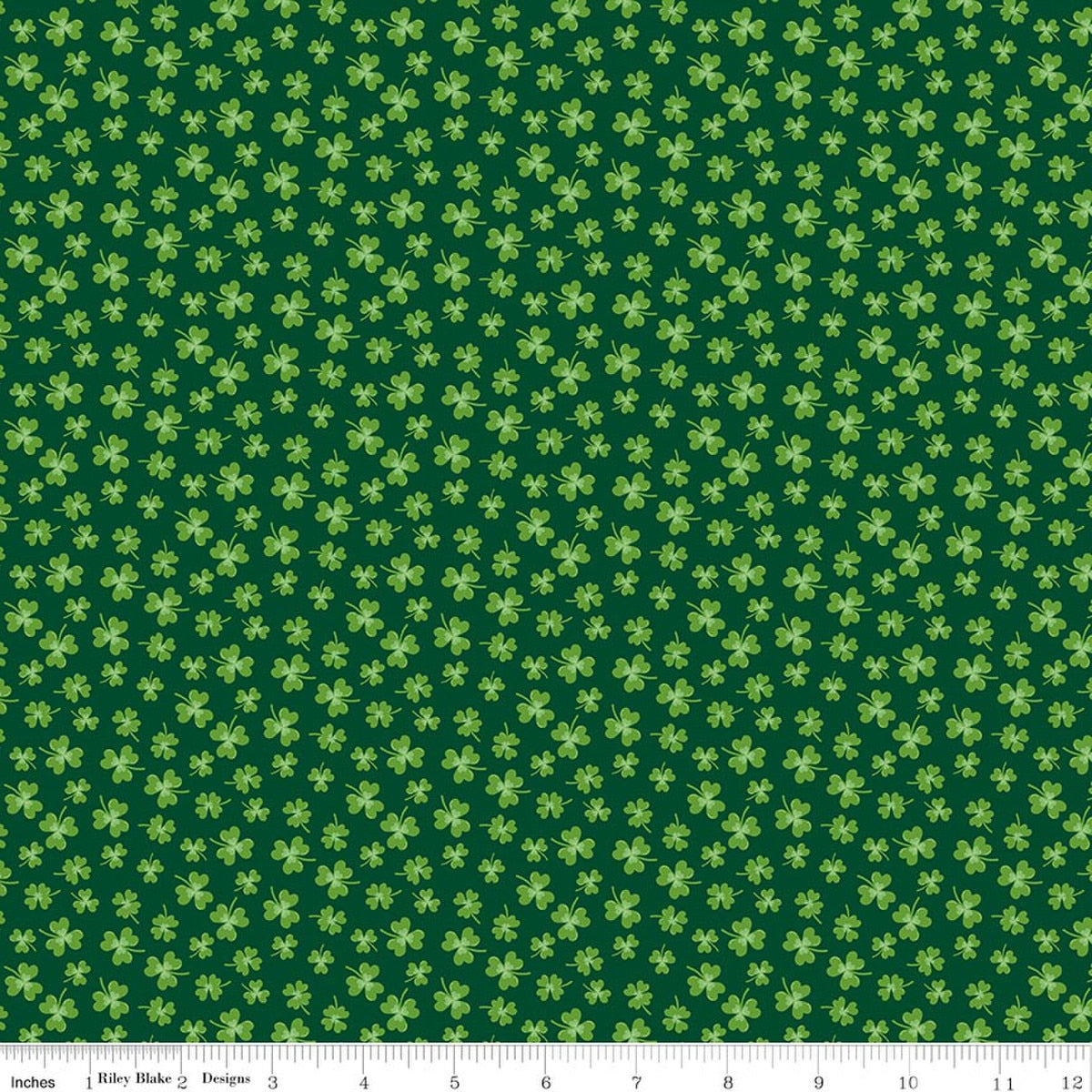 Green fabric with small green shamrock patterns