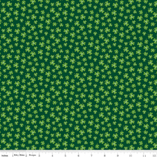 Green fabric with small green shamrock patterns