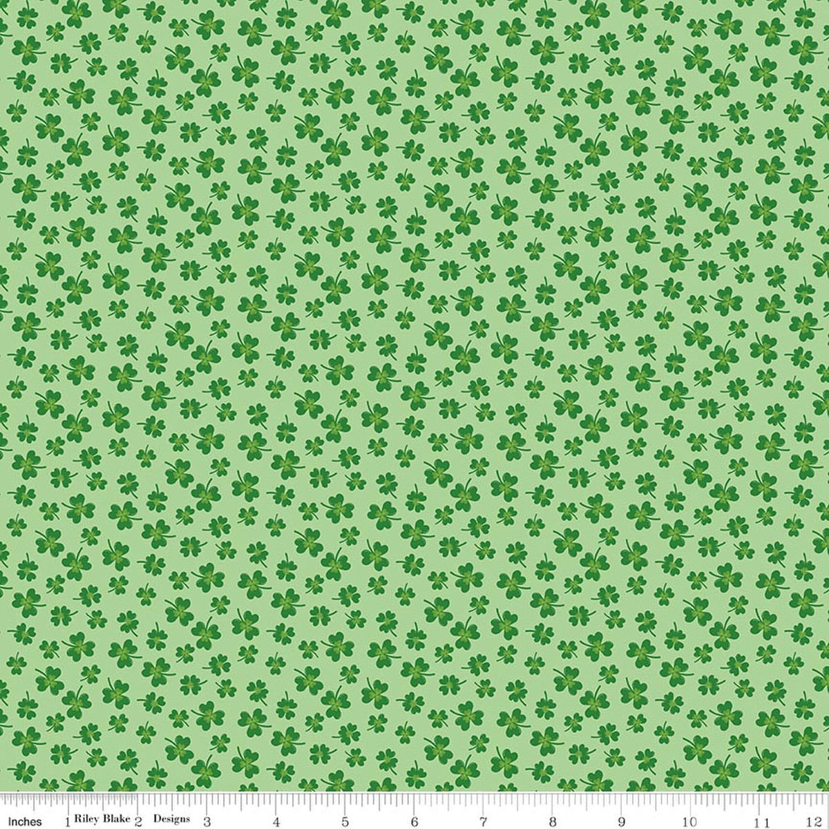 Pattern of green shamrocks on a light green background