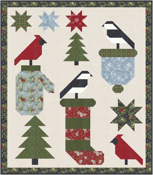 Christmas-themed quilt with cardinal, tree, and star patterns on a beige background.