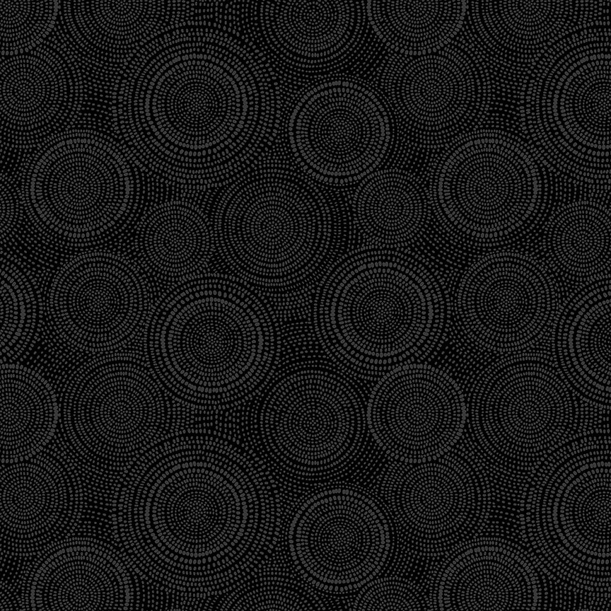 Black circular pattern on a black background